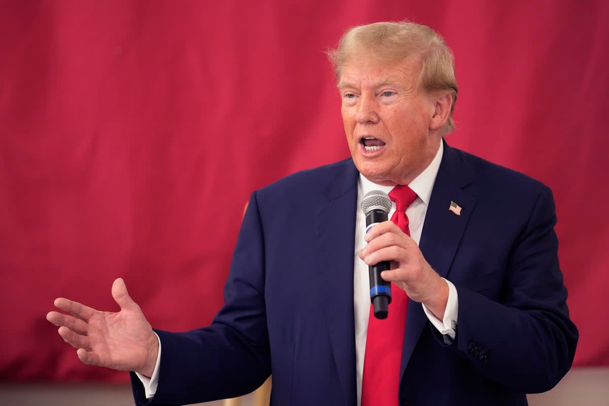 Republican presidential candidate and former President Donald Trump speaks to Texas state troopers and guardsmen at the South Texas International Airport on Nov. 19, 2023 (AP)