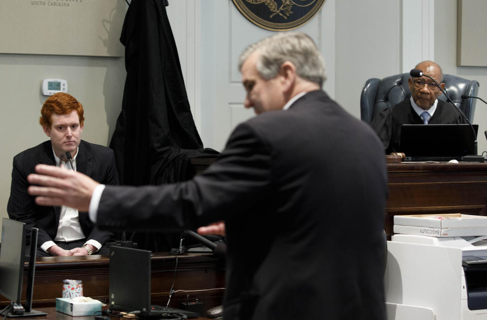 Prosecutor John Meadors questions Buster Murdaugh, the son of Alex Murdaugh, during his father's trial Colleton County Courthouse in Walterboro, S.C., on Tuesday, Feb. 21, 2023. The 54-year-old attorney is standing trial on two counts of murder in the shootings of his wife and son at their Colleton County, S.C., home and hunting lodge on June 7, 2021. (Grace Beahm Alford/The Post And Courier via AP, Pool)