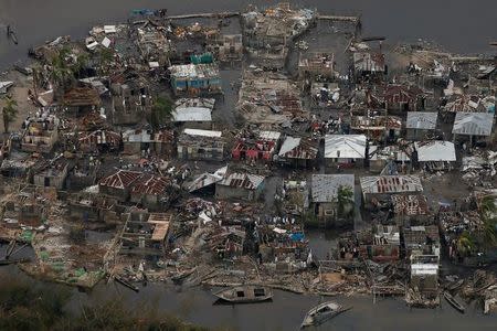 Destroyed houses are seen in a village after Hurricane Matthew passes Corail, Haiti, October 6, 2016. REUTERS/Carlos Garcia Rawlins