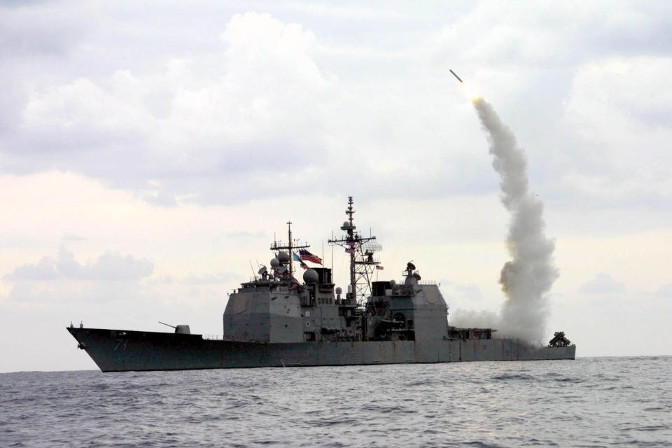 FILE - A Tomahawk Land Attack Missile (TLAM) launches from the guided missile cruiser USS Cape St. George (CG 71), in operation in the Mediterranean Sea, on March 23, 2003. Japan stepped up its alarm over China's assertiveness in the region, its growing military ties to Russia and its claims on Taiwan in an annual defense paper released Friday, July 28, 2023 that is the first under Tokyo's new security strategy calling for a major military buildup.(Intelligence Specialist 1st Kenneth Moll/U.S. Navy via AP, File)