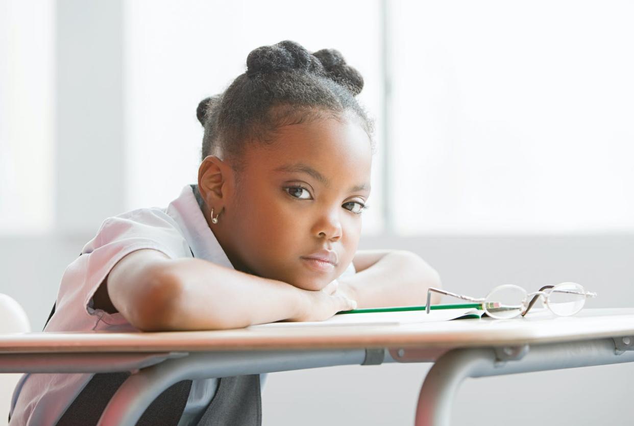 <span class="caption">The strict discipline of 'no-excuses' charter schools can often make students feel stressed out. </span> <span class="attribution"><a class="link " href="https://www.gettyimages.com/detail/photo/schoolgirl-in-class-royalty-free-image/88434344?adppopup=true" rel="nofollow noopener" target="_blank" data-ylk="slk:Image Source/Getty Images;elm:context_link;itc:0;sec:content-canvas">Image Source/Getty Images</a></span>