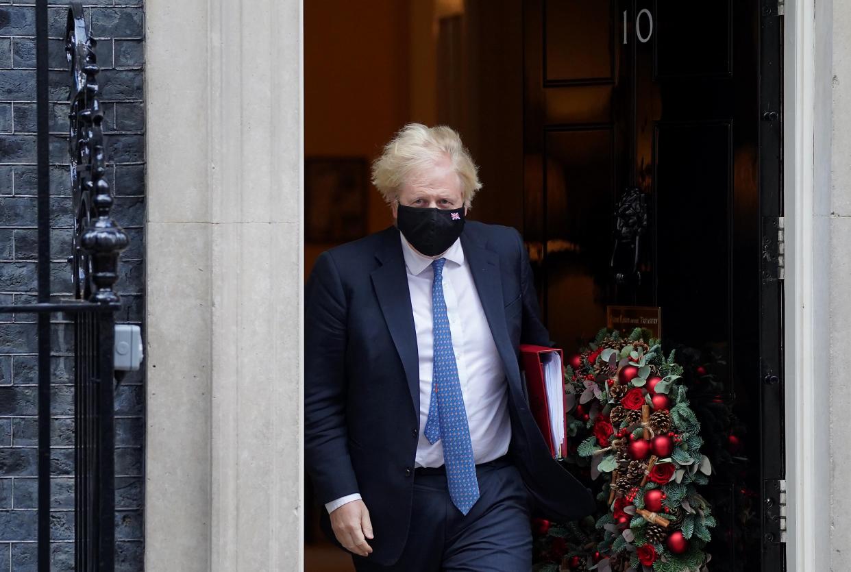 Prime Minister Boris Johnson leaves 10 Downing Street, London, to attend Prime Minister's Questions at the Houses of Parliament. Picture date: Wednesday December 1, 2021.
