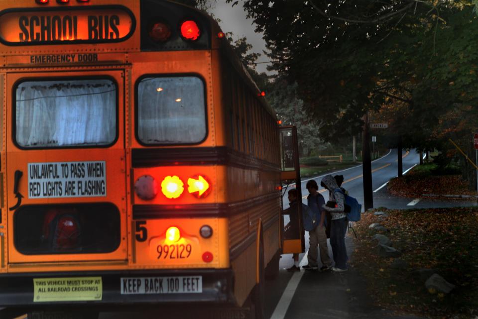 Students board a bus in this USA Today Network file photo from November.