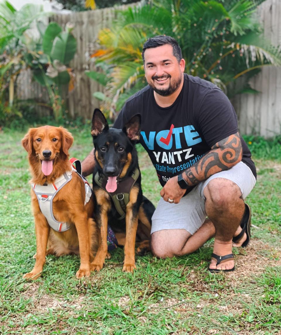 Anthony Yantz, with his golden retriever, Luna, and German shepherd, Thor. Yantz is the Democratic candidate for District 33, challenging incumbent Republican Randy Fine.