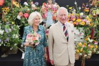 <p>Prince Charles and Camilla attended the Sandringham Flower Show, which returned for the first time since 2019. Here, they posed for a portrait in front of a floral display, and Camilla looked lovingly at her husband.</p><p><a class="link " href="https://www.townandcountrymag.com/society/tradition/g40731511/prince-charles-camilla-sandringham-flower-show-2022-photos/" rel="nofollow noopener" target="_blank" data-ylk="slk:See more photos from the flower show here;elm:context_link;itc:0;sec:content-canvas">See more photos from the flower show here</a></p>