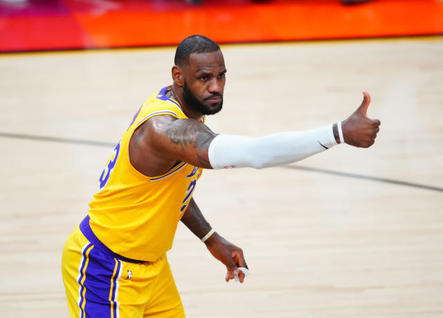 MORE THAN AN ATHLETE . LeBron James Yellow Los Angeles Lakers