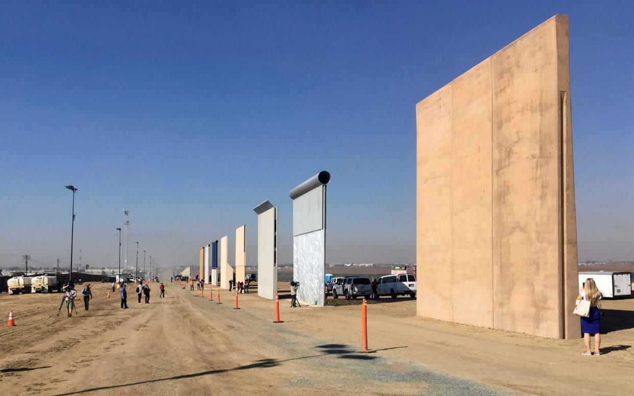 Prototypes of Donald Trump's border wall standing in San Diego - AP