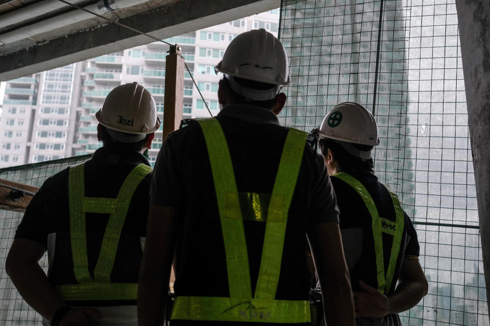 Safety officers conduct inspections at an Ayala Land Inc. development under construction in the Makati City. (Photo: Bloomberg)