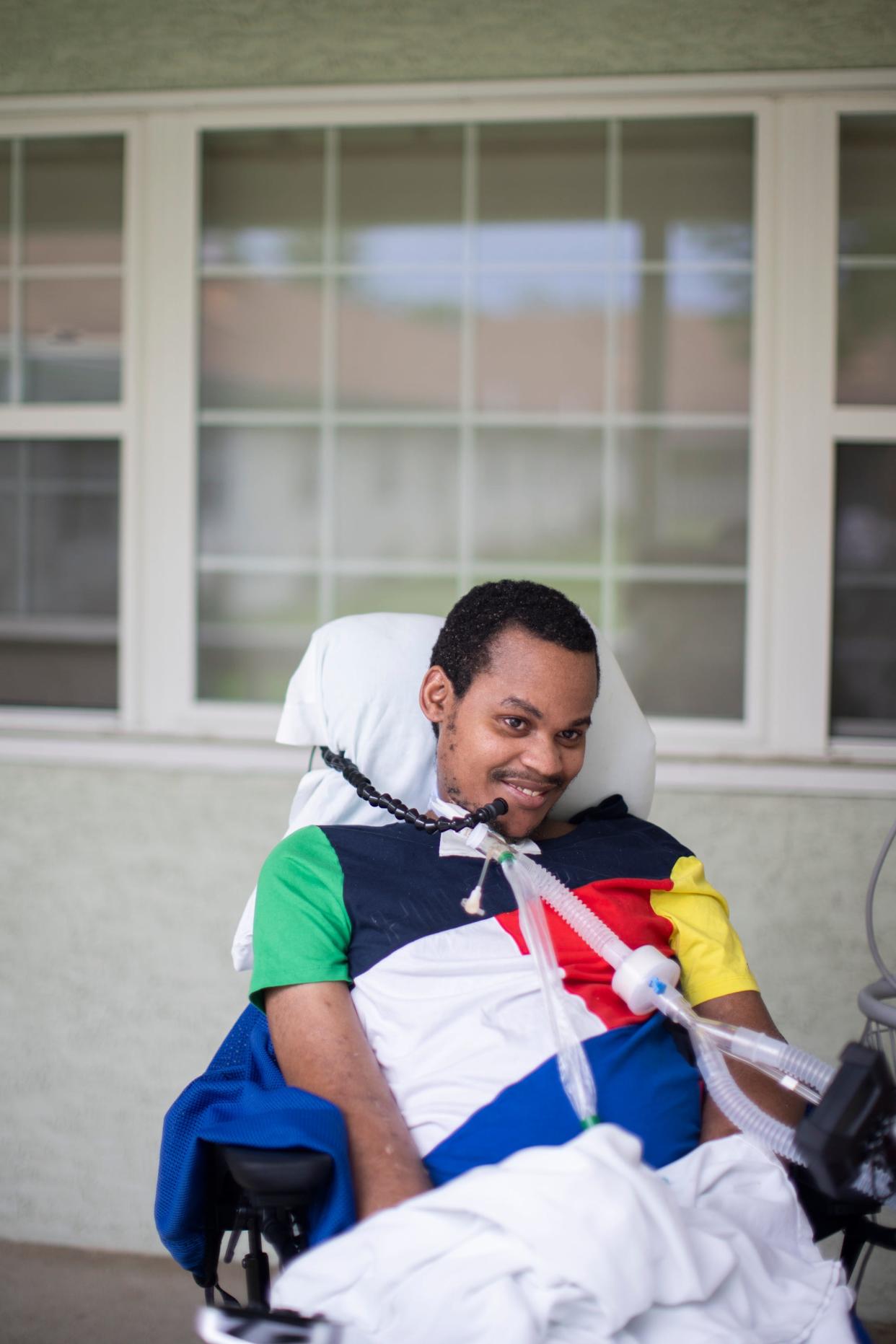 Kassim Omar goes outside at her Far East Side nursing home for the first time in months. Omar, 29, is a transgender woman who was shot in the back of the neck in 2022 at Wedgewood Village apartments. The shooting left her paralyzed from the neck down.