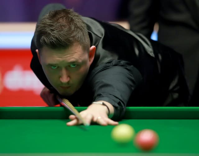 Kyren Wilson, pictured, won three successive frames to build a 10-6 lead against Judd Trump