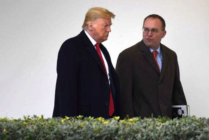 President Trump with acting White House chief of staff Mick Mulvaney, January 2020. (Susan Walsh/AP)