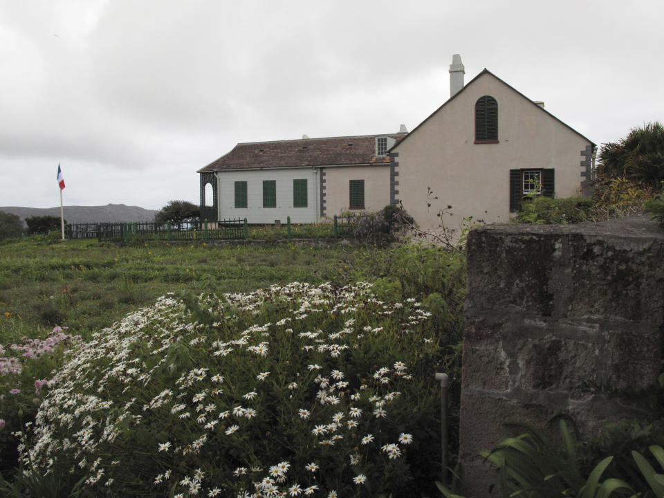 FILE - In this Oct. 14, 2017, file photo, a view of Longwood House on St. Helena in the Atlantic Ocean, where Napoleon Bonaparte lived during his exile until his death in 1821. Commemorations of the May 5, 1821 death of Napoleon are going ahead on St. Helena, the remote South Atlantic island where the deposed French emperor died in exile. But they are not happening with an influx of international visitors that was expected before COVID-19 swept across the world. While the volcanic island has not had any confirmed COVID-19 cases, reaching it got even harder because of travel restrictions during the pandemic. (AP Photo/Christopher Torchia, File)