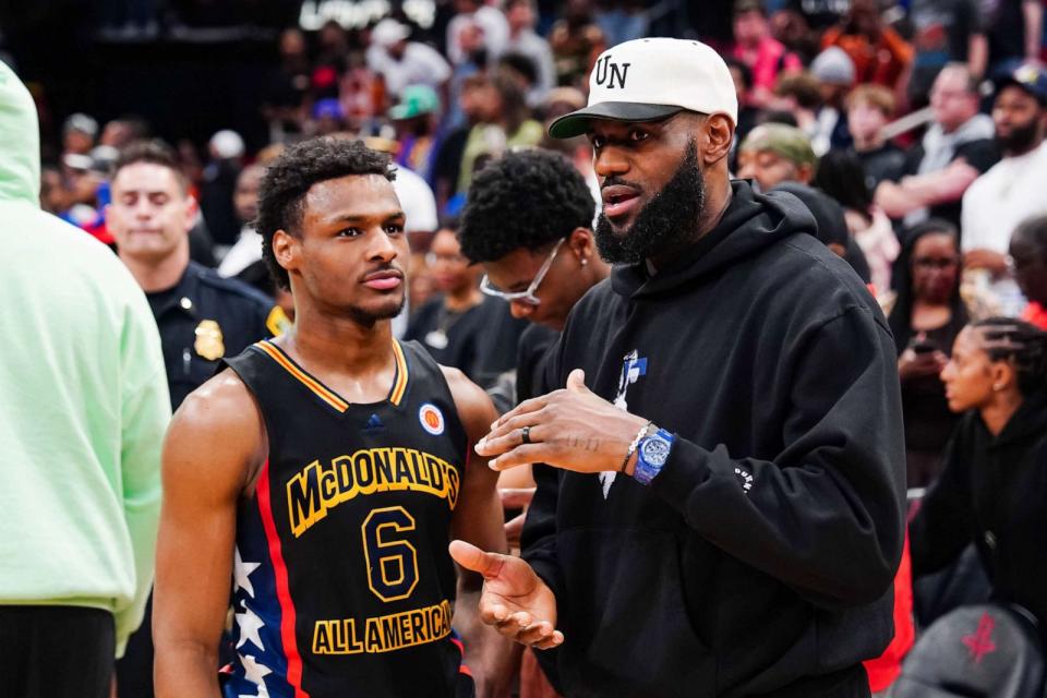 PHOTO: FILE - Bronny James #6 of the West team talks to Lebron James of the Los Angeles Lakers after the 2023 McDonald's High School Boys All-American Game at Toyota Center, March 28, 2023 in Houston. (Alex Bierens De Haan/Getty Images, FILE)