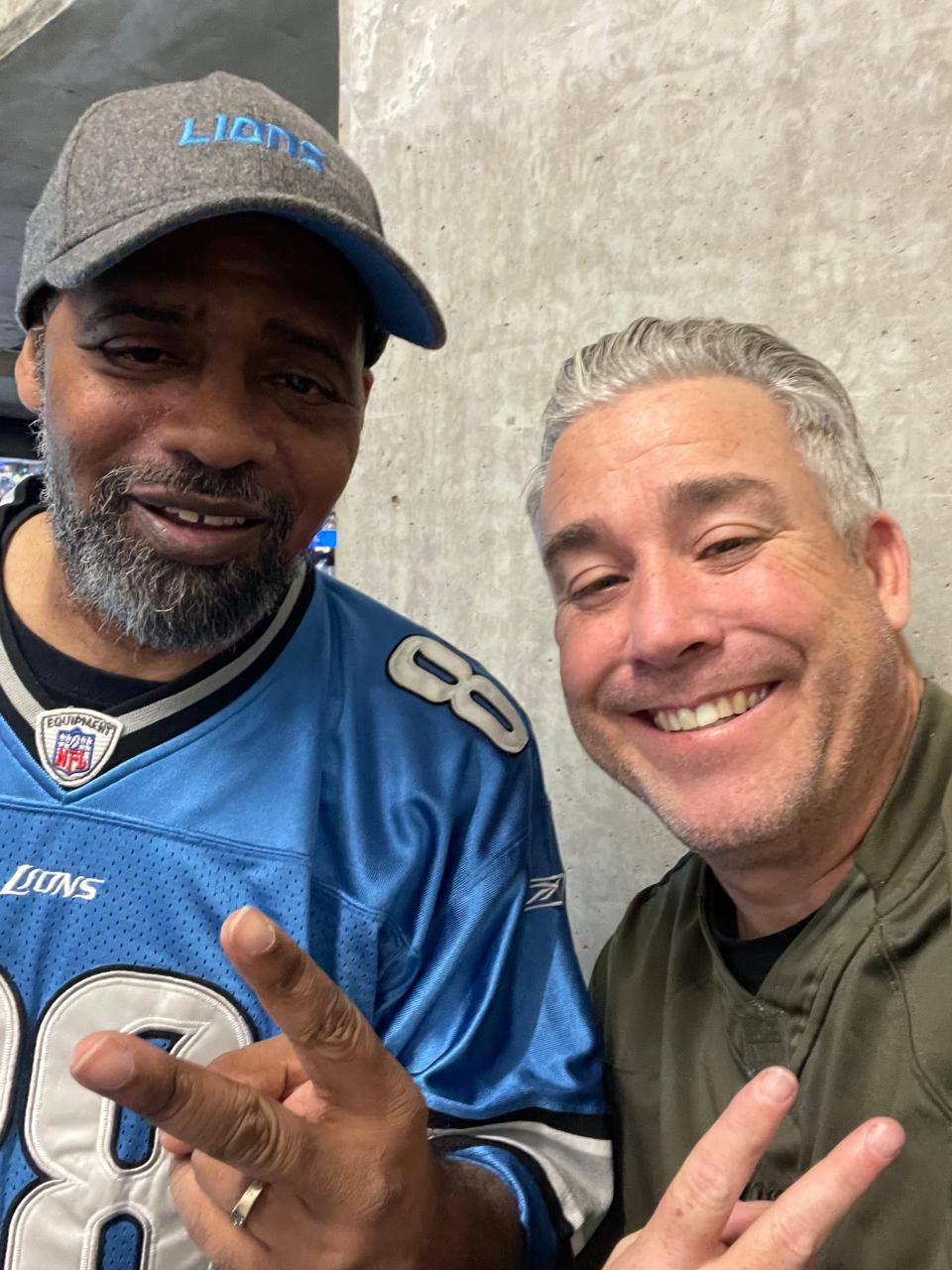 Darren A. Nichols, left, and Brian Rankin, at Ford Field in Detroit, on Dec. 4, 2022, became friends because their season tickets to the Detroit Lions are in the same section.