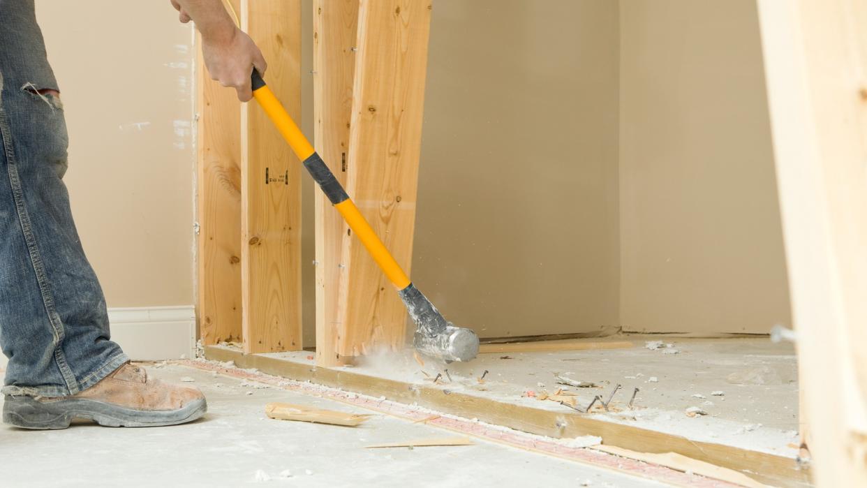"Heavy, Breaking, Concrete, Construction, Construction Frame, Construction Site, Demolishing, Domestic Room, Floor, Frame, HITTING, Hammer, Holding, Home Improvement, Home Interior, Horizontal, House, Human Hand, Industry, Manual Worker, Nail, Plank, Removing, STUD, Sledgehammer, Swinging, Wall, Wall Frame", Wood