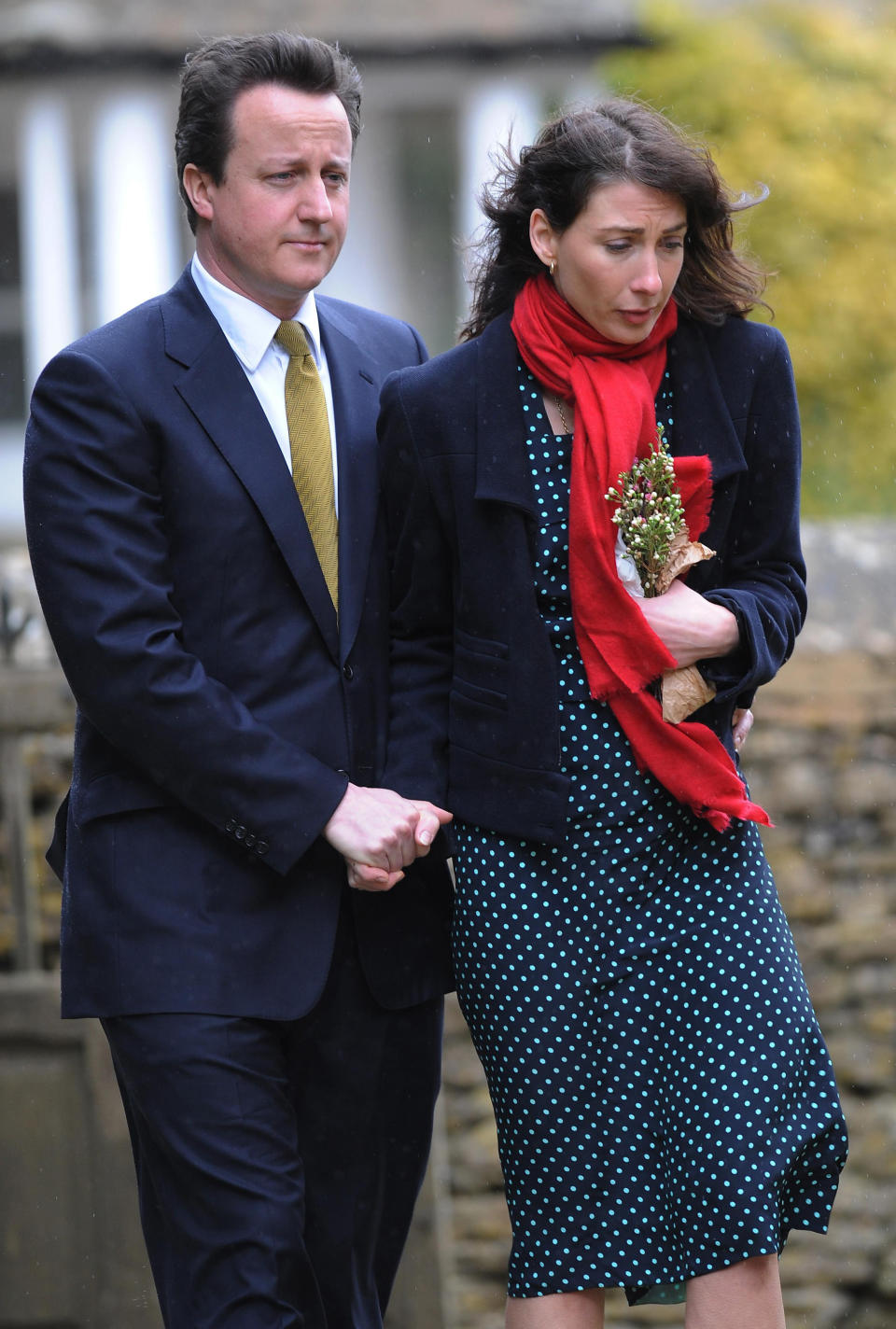 Conservative Party leader David Cameron and his wife Samantha arrive at St Nicholas Church in Chadlington, Oxfordshire for the funeral of their son Ivan who died last week.