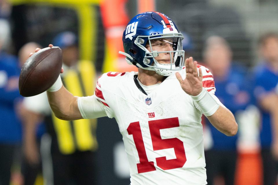 November 5, 2023; Paradise, Nevada, USA; New York Giants quarterback Tommy DeVito (15) passes the football against the Las Vegas Raiders during the second quarter at Allegiant Stadium. Mandatory Credit: Kyle Terada-USA TODAY Sports