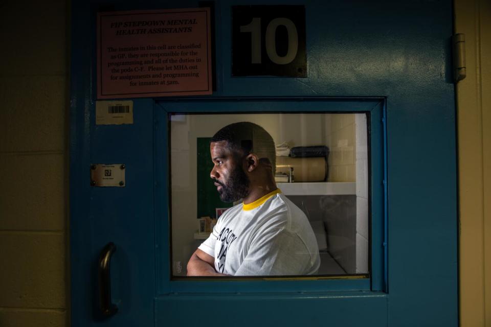 Craigen Armstrong seen through a window