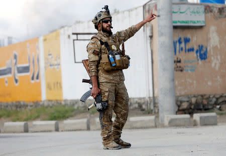 Afghan security forces keep watch outside a mosque after a blast in Kabul, Afghanistan May 24, 2019. REUTERS/Omar Sobhani