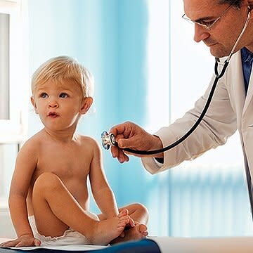 toddler with doctor