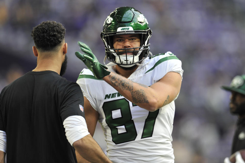 Dec 4, 2022; Minneapolis, Minnesota, USA; New York Jets tight end <a class="link " href="https://sports.yahoo.com/nfl/players/28545/" data-i13n="sec:content-canvas;subsec:anchor_text;elm:context_link" data-ylk="slk:C.J. Uzomah;sec:content-canvas;subsec:anchor_text;elm:context_link;itc:0">C.J. Uzomah</a> (87) warms up before the game against the <a class="link " href="https://sports.yahoo.com/nfl/teams/minnesota/" data-i13n="sec:content-canvas;subsec:anchor_text;elm:context_link" data-ylk="slk:Minnesota Vikings;sec:content-canvas;subsec:anchor_text;elm:context_link;itc:0">Minnesota Vikings</a> at U.S. Bank Stadium. Mandatory Credit: Jeffrey Becker-USA TODAY Sports