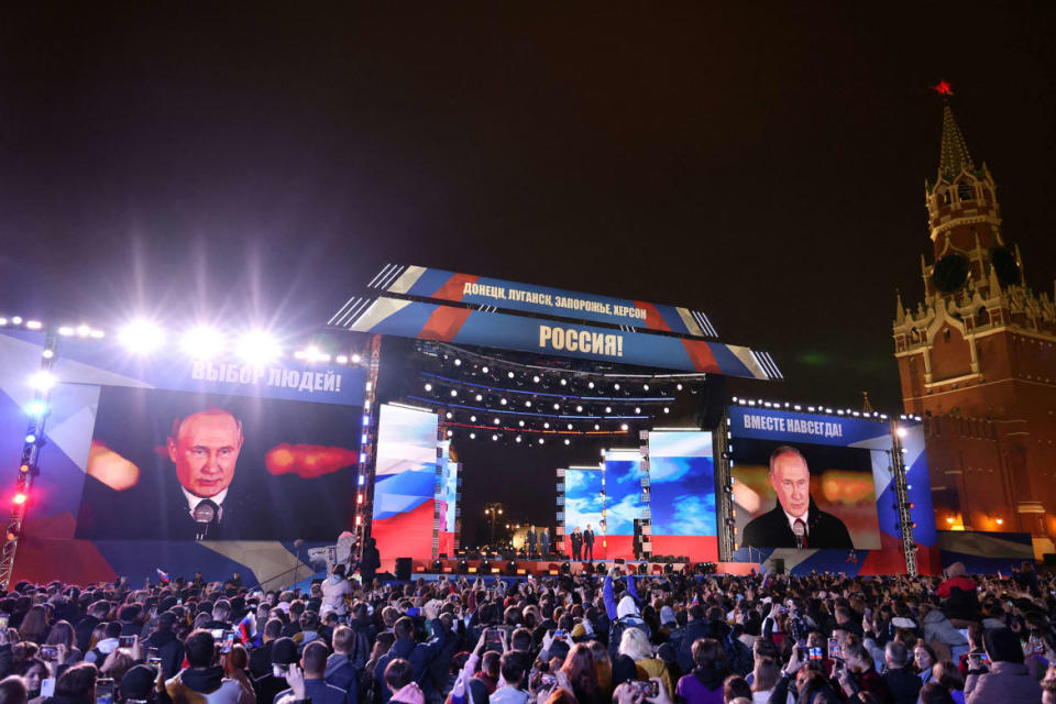 <div class="inline-image__caption"><p>Spectators listen to President Vladimir Putin marking the declared annexation of the Russian-controlled territories of Ukraine’s Donetsk, Luhansk, Kherson, and Zaporizhzhia regions in Red Square, Moscow, Russia, on Sept. 30, 2022.</p></div> <div class="inline-image__credit">Pool via Reuters</div>