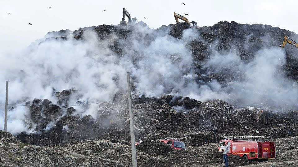 Firemen work to douse the fire at Ghazipur landfill on April 22, 2024 in New Delhi, India. - Vipin Kumar/Hindustan Times/Getty Images