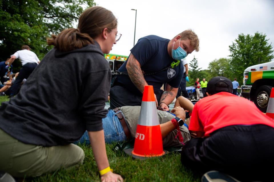 Actors and first responders participate in a mass casualty training exercise near Lubbers Stadium in Allendale.