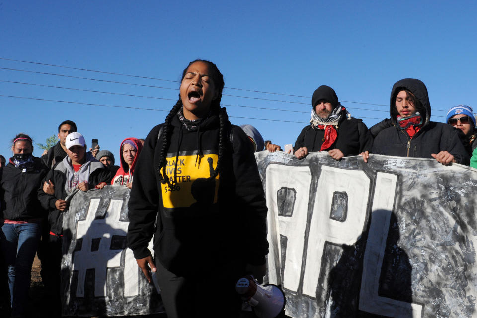 <p>A member of the Black Lives Matter movement speaks during a protest against the Dakota Access pipeline near the Standing Rock Indian Reservation in Mandan, North Dakota, U.S. November 12, 2016. (Photo: Stephanie Keith/Reuters) </p>