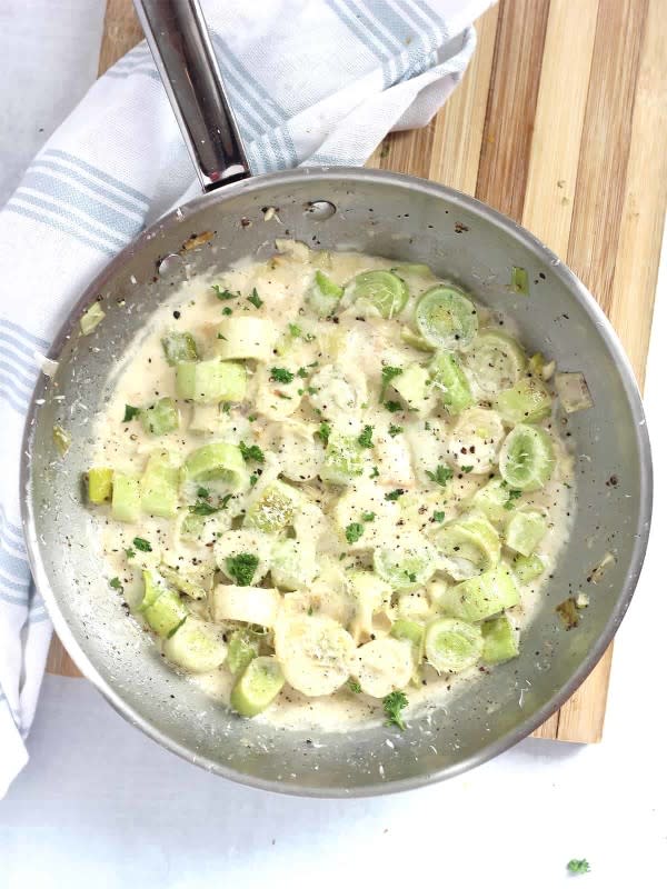 <p>Bite on the Side</p><p>Creamy and cheesy, these parmesan creamed leeks are a quick and easy veggies side. Cooked in one skillet on the stovetop and ready to serve in 15 minutes.</p><p><strong>Get the recipe: <a href="https://biteontheside.com/parmesan-creamed-leeks/" rel="nofollow noopener" target="_blank" data-ylk="slk:Parmesan Creamed Leeks;elm:context_link;itc:0;sec:content-canvas" class="link "><em>Parmesan Creamed Leeks</em></a></strong></p>