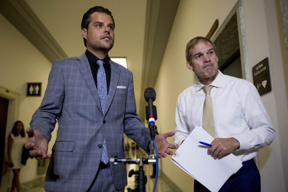 Rep. Matt Gaetz, R-Fla., left, accompanied by Ranking Member Rep. Jim Jordan, R-Ohio, right, speaks to members of the media following a House Judiciary Committee closed door meeting with former federal prosecutor for the Southern District of New York Geoffrey Berman on Capitol Hill, Thursday, July 9, 2020, in Washington. (AP Photo/Andrew Harnik)