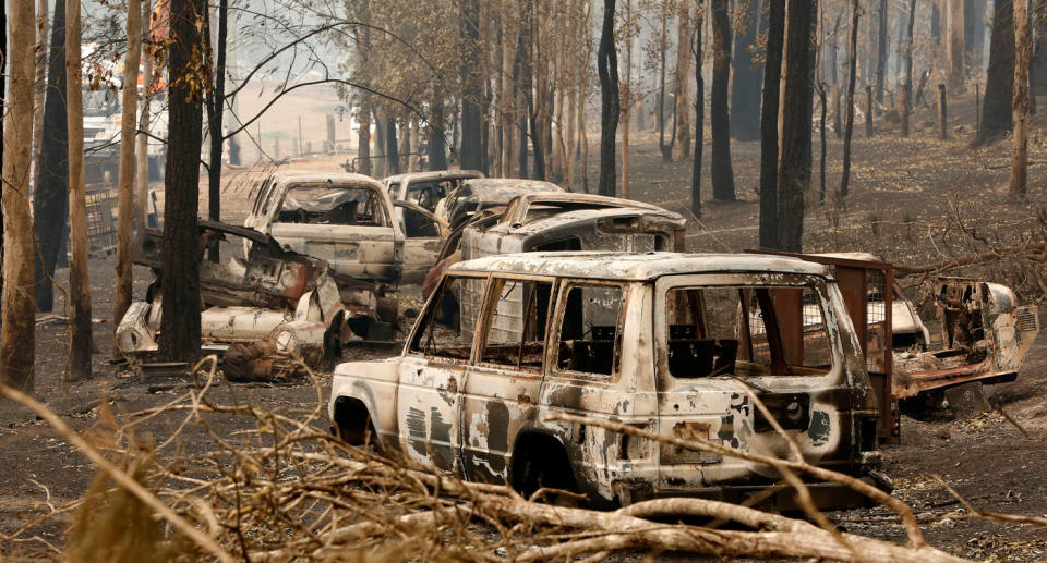 Cars gutted by bushfire that destroyed parts of Rainbow Flat in NSW over the weekend.