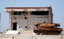 A Syrian army military tank is seen in the town of Morek, Hama district