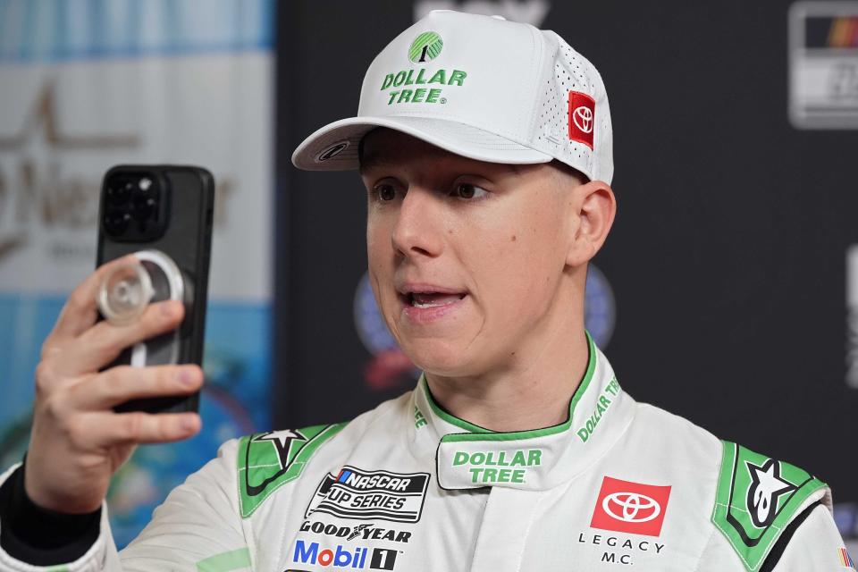 John Hunter Nemechek takes part in an interview over the phone during the NASCAR Daytona 500 auto racing media day Wednesday, Feb. 14, 2024, at Daytona International Speedway in Daytona Beach, Fla. (AP Photo/Chris O'Meara)