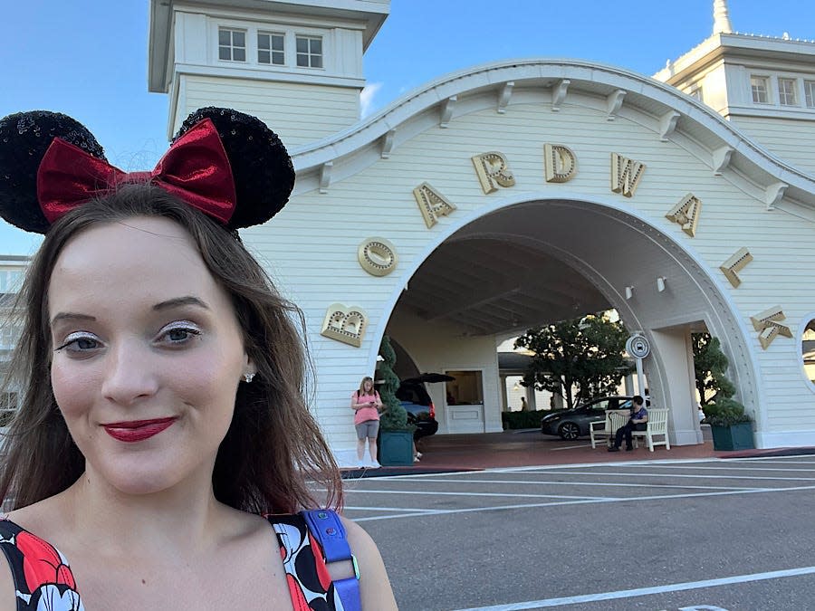 Author taking selfie in front of Disney Boardwalk Inn.