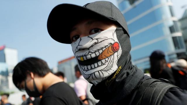 Hong is turning to a 1922 law that was used to quell a seamen's ban face masks