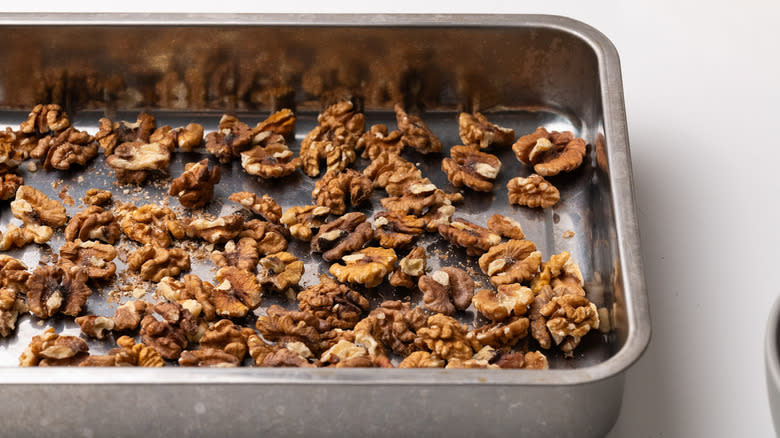 Toasted walnuts in pan