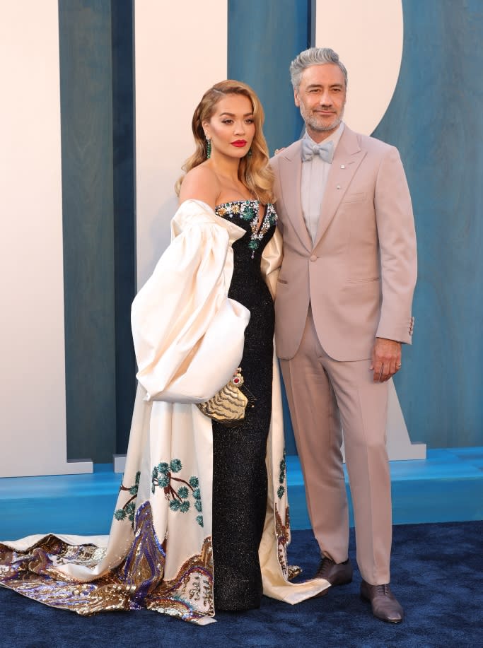 Rita Ora and boyfriend Taika Waititi attend the Vanity Fair Oscars after-party in glamorous looks. - Credit: Variety