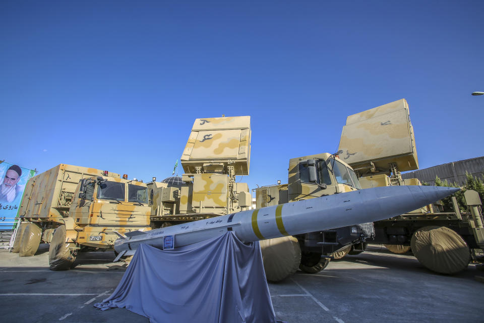 This photo released by the official website of the Iranian Defense Ministry shows Iran-made Bavar-373 air-defense missile system in a ceremony to unveil by President Hassan Rouhani, Iran, Thursday, Aug. 22, 2019. Iran says the Bavar-373 is a long-range surface-to-air missile system able to recognize up to 100 targets at a same time and confront them with six different weapons. (Iranian Defense Ministry via AP)