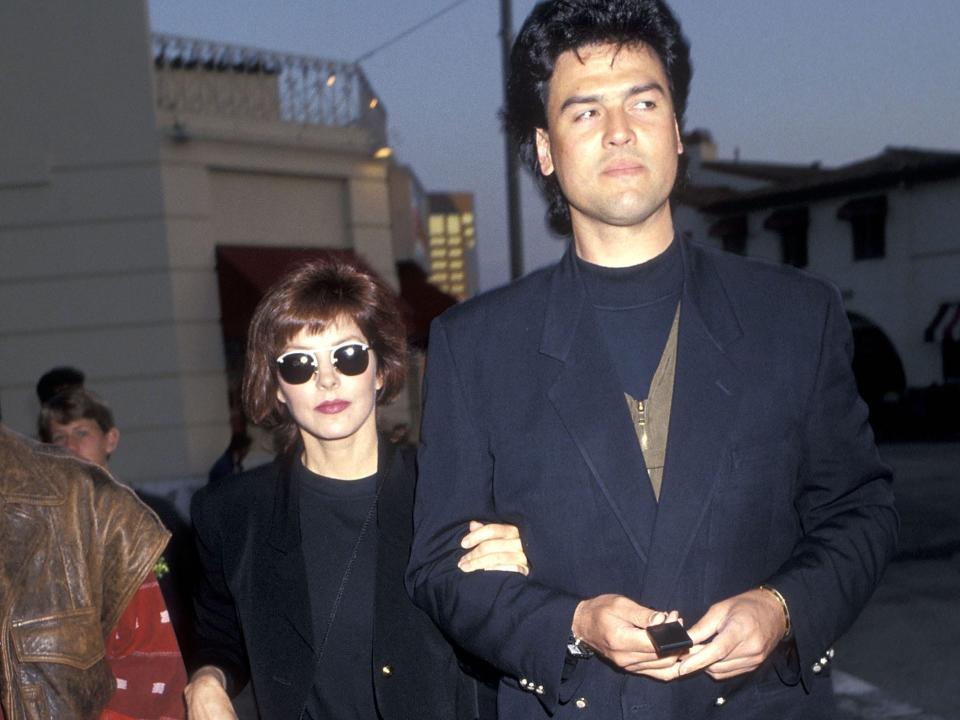 Actress Priscilla Presley and boyfriend Marco Garibaldi attend the "The Naked Gun 2½: The Smell of Fear" Westwood Premiere on June 13, 1991