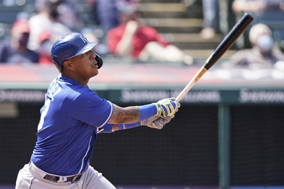 Kansas City Royals' Salvador Perez watches his ball after hitting a solo home run off Cleveland Indians starting pitcher Shane Bieber in the fourth inning of a baseball game, Wednesday, April 7, 2021, in Cleveland. (AP Photo/Tony Dejak)