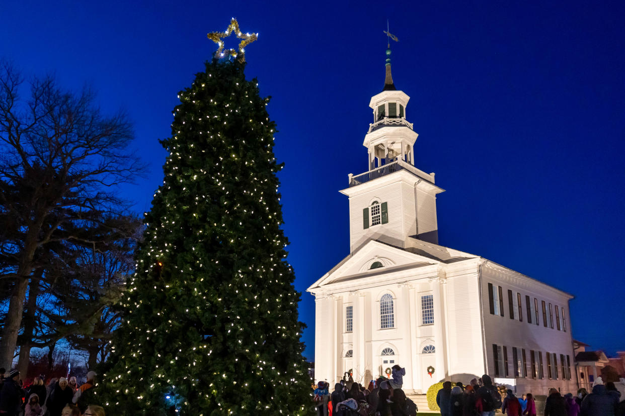 Crowds gather for a tree-lighting ceremony in December 2022 at Tallmadge Circle.