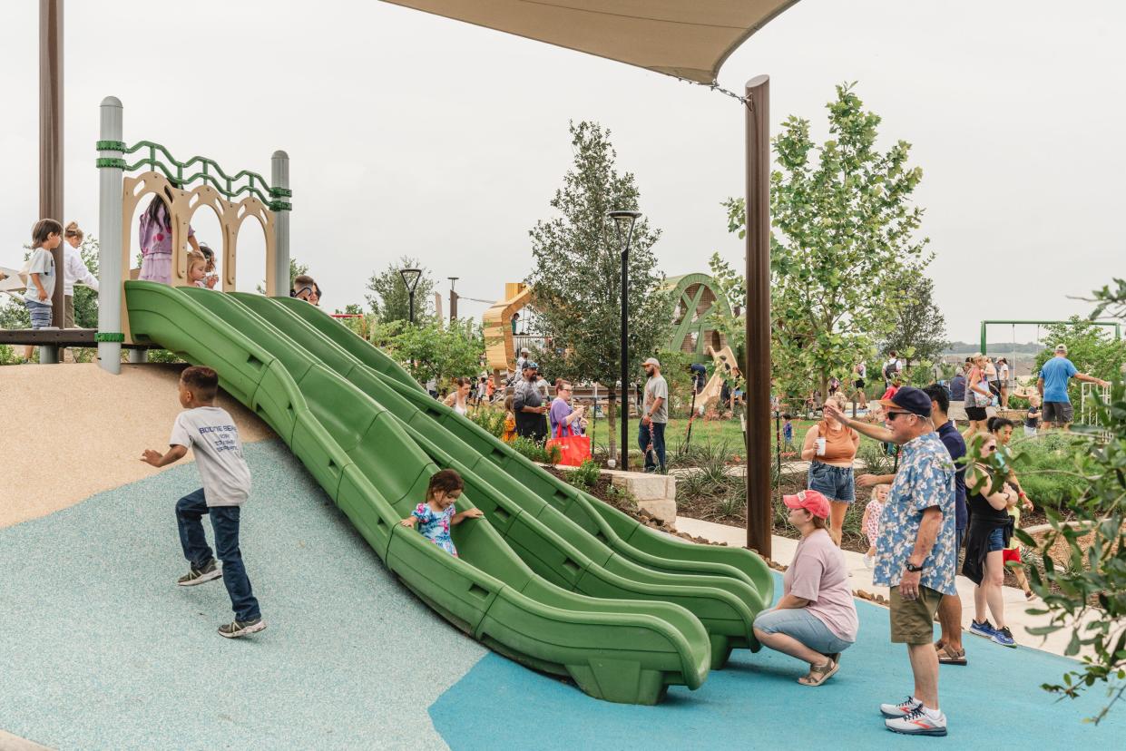 Among other features, Skyline Park has a splash pad, an open lawn and two playgrounds. Both playscapes were designed with the help of TBG landscape architects, planners and designers.