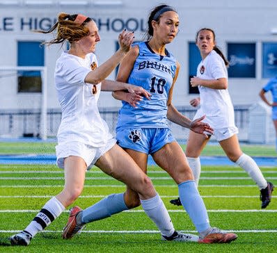 Bartlesville High's Jaci Decker makes a pass during girls soccer play in the 2022 season.