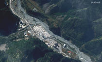 This satellite image provided by Maxar Technologies shows vehicles queuing to cross the Upper Lars checkpoint on the Russian-Georgia border, on Tuesday Sept. 27, 2022, after Russian President Vladimir Putin announced a partial mobilization in Russia. (Satellite image ©2022 Maxar Technologies via AP)