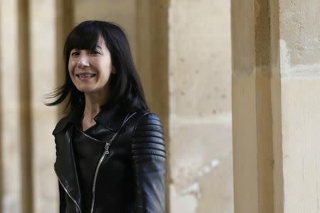 French designer Bouchra Jarrar appears at the end of her Haute Couture Fall/Winter 2014-2015 fashion show in Paris July 8, 2014. REUTERS/Gonzalo Fuentes
