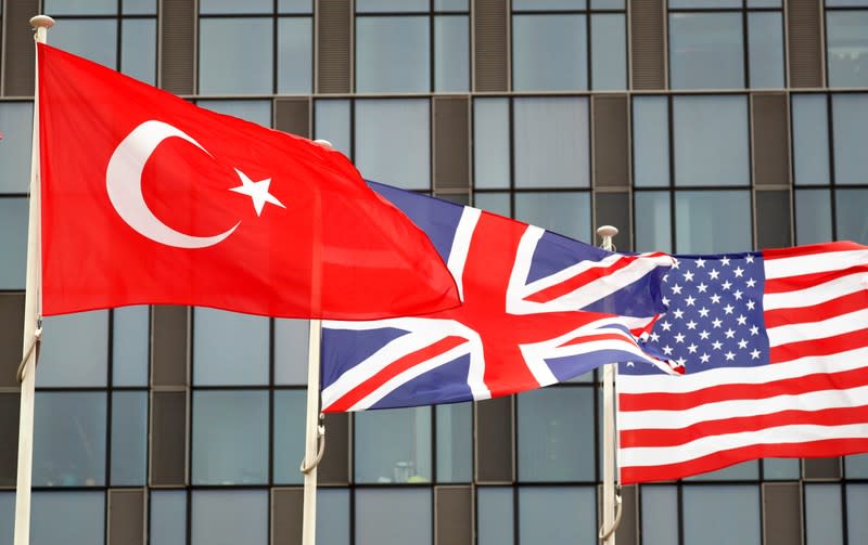 Turkish, British and U.S. flags flutter at NATO headquarters in Brussels