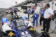 Graham Rahal looks at his car during practice for the Indianapolis 500 auto race at Indianapolis Motor Speedway, Friday, May 19, 2023, in Indianapolis. (AP Photo/Darron Cummings)