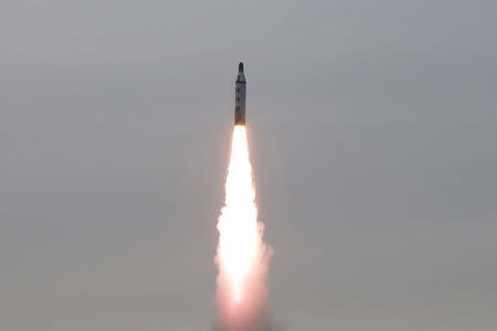 North Korean leader Kim Jong Un guides on the spot the underwater test-fire of strategic submarine ballistic missile in this undated photo released by North Korea's Korean Central News Agency (KCNA) in Pyongyang on April 24, 2016. KCNA/via REUTERS.