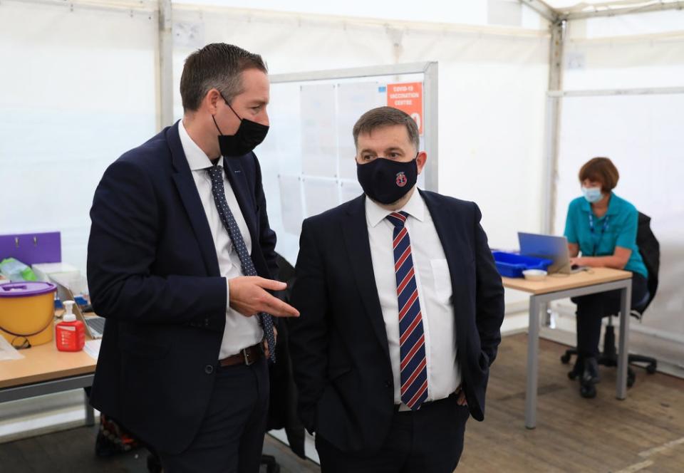 Northern Ireland First Minister Paul Givan (left) and Minister for Health Robin Swann visit a Covid-19 Vaccination centre at the Balmoral show, Lisburn (Peter Morrison/PA) (PA Media)